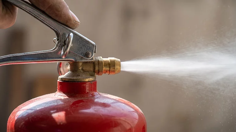 Auslösung am Feuerlöscher